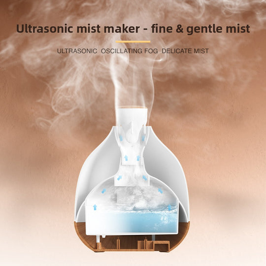 Ultrasonic aroma diffuser emitting steam with wood grain base on wooden table against a neutral background